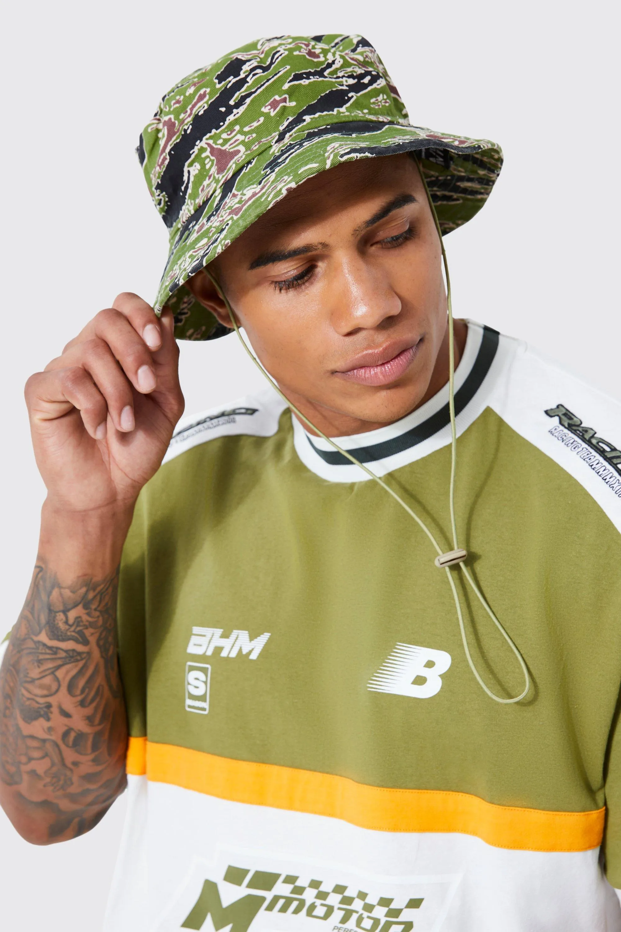 Camo Bungee Bucket Hat | boohooMAN UK