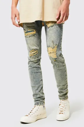 Super Skinny Busted Knee Rip & Repair Jeans