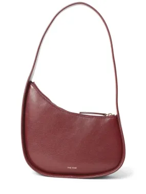 The Row   Half Moon shiny leather shoulder bag 